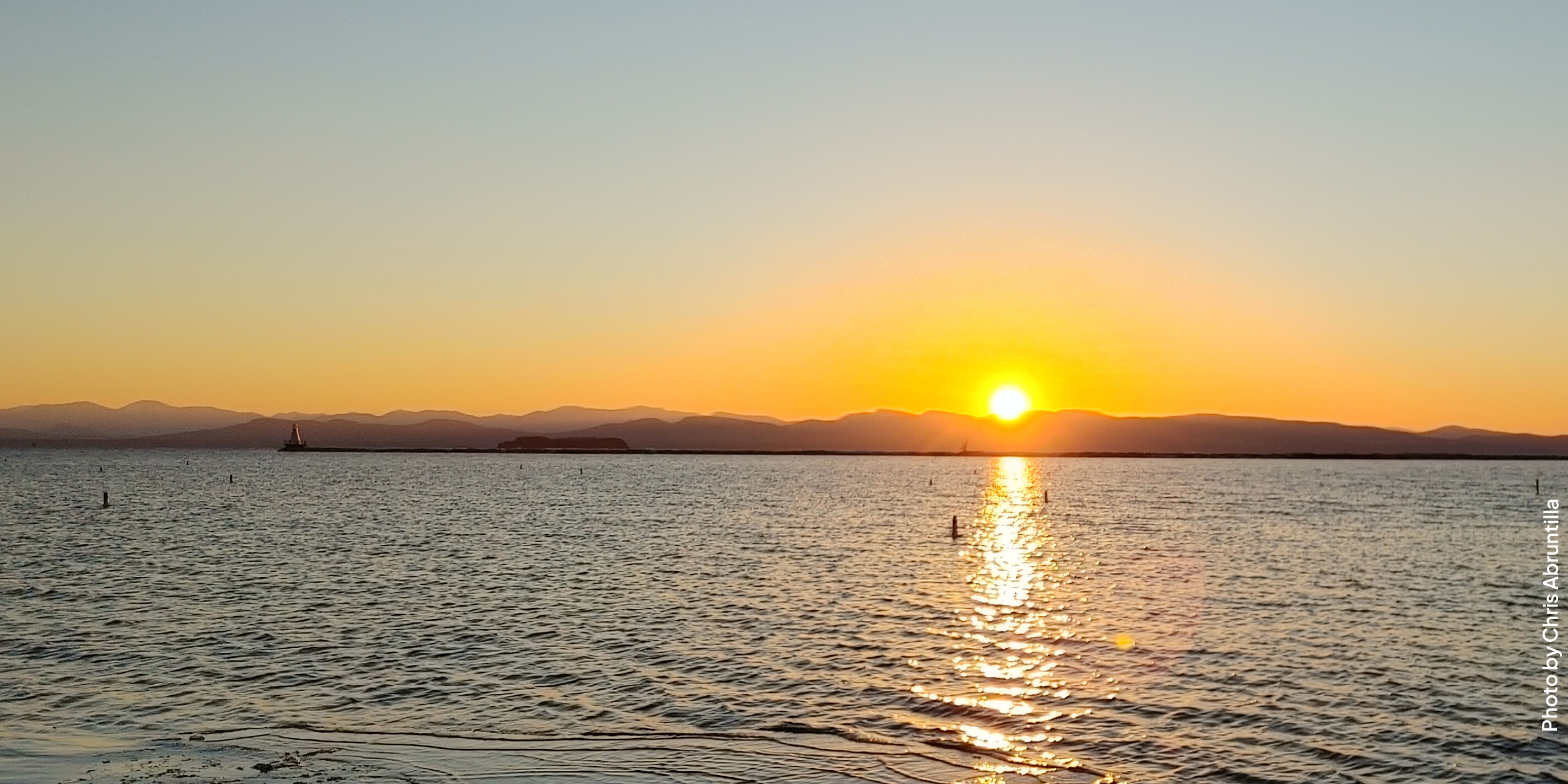 The sun setting over Lake Champlain